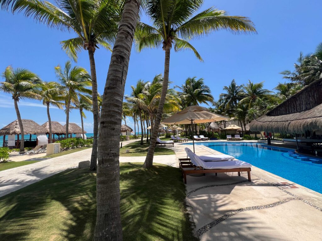 Beachfront pool area at El Dorado Royale Riviera Maya
