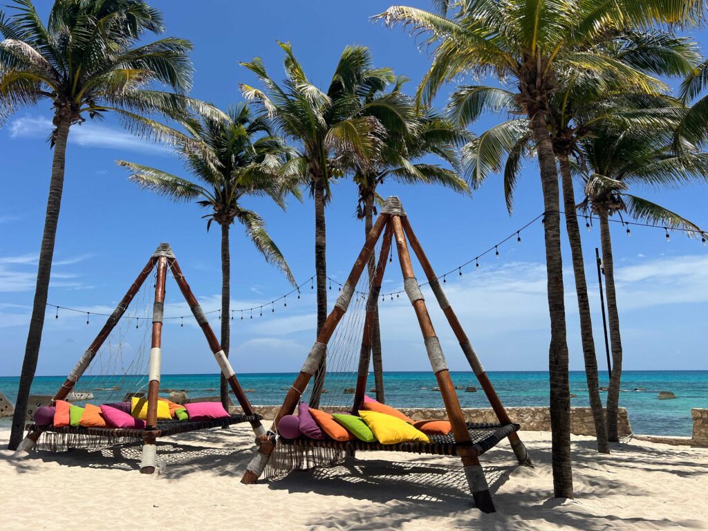 Oceanfront lounge beds on the beach at El Dorado Royale