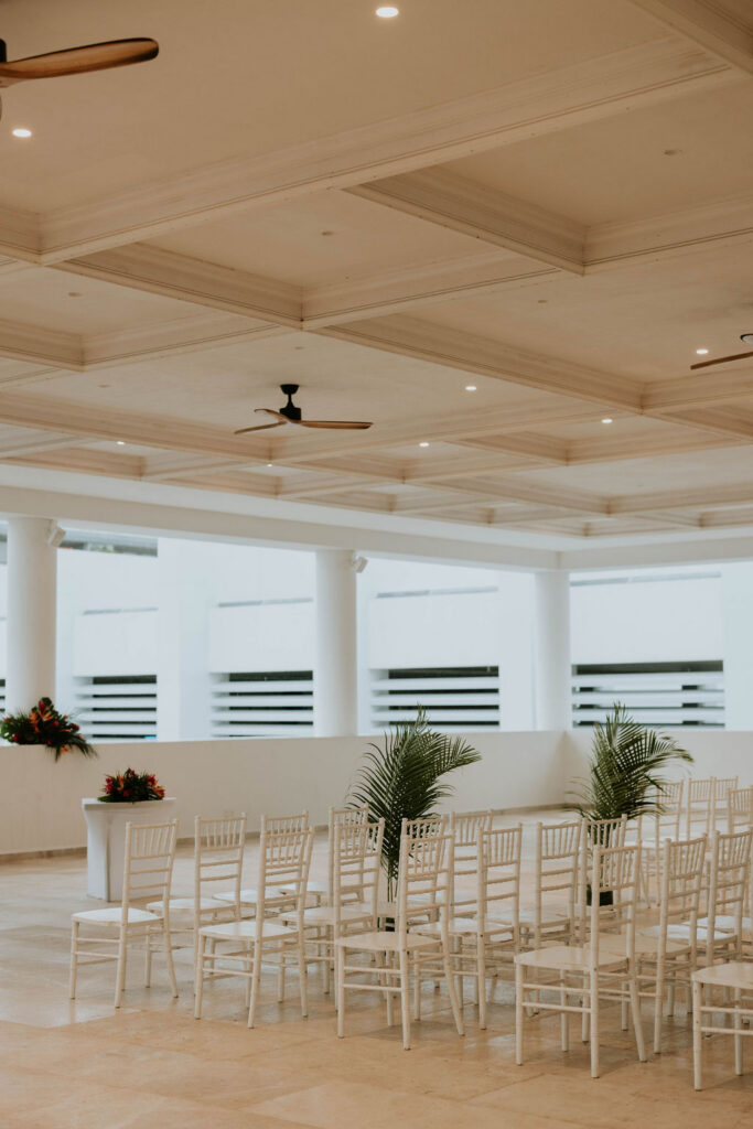 Rain backup ceremony setup at Majestic Elegance Costa Mujeres prepared due to rainy wedding day weather.