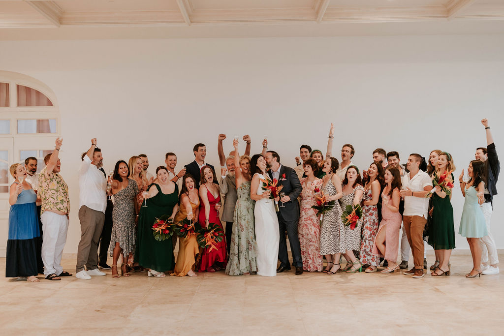 Wedding guests celebrating after the ceremony at Majestic Elegance Costa Mujeres.