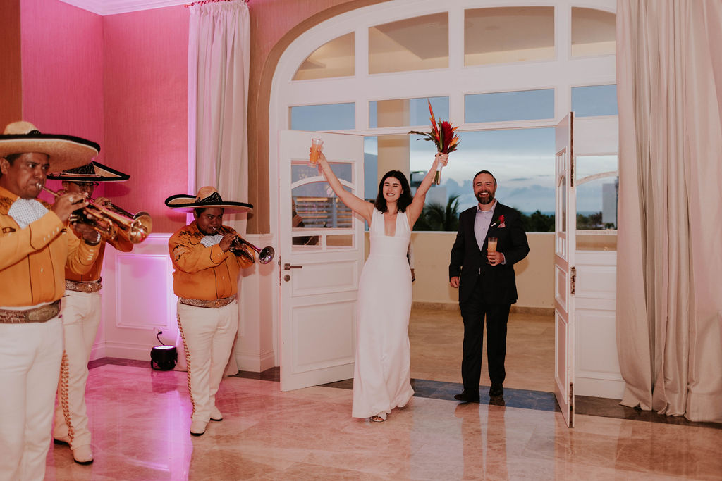 Surprise mariachi band wedding reception entrance at Majestic Elegance Costa Mujeres in Mexico.