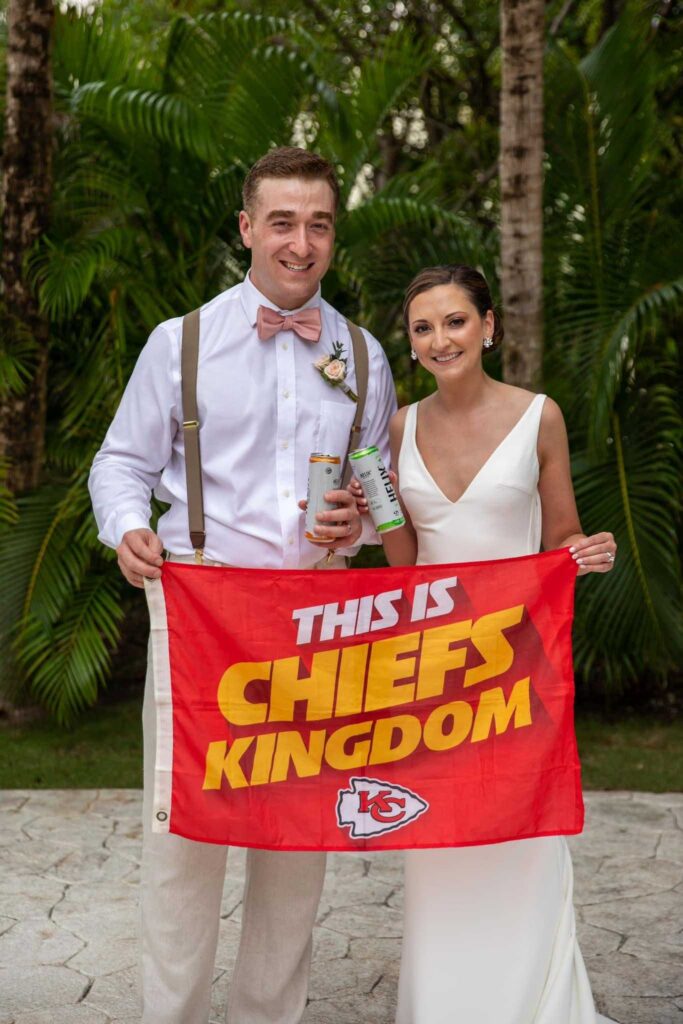 Kansas City Chiefs fans celebrating their destination wedding in Riviera Maya