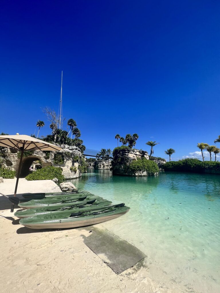 Boats on the beach at Hotel Xcaret Arte in Riviera Maya, Mexico, one of the best all inclusive resorts for a honeymoon in Mexico​
