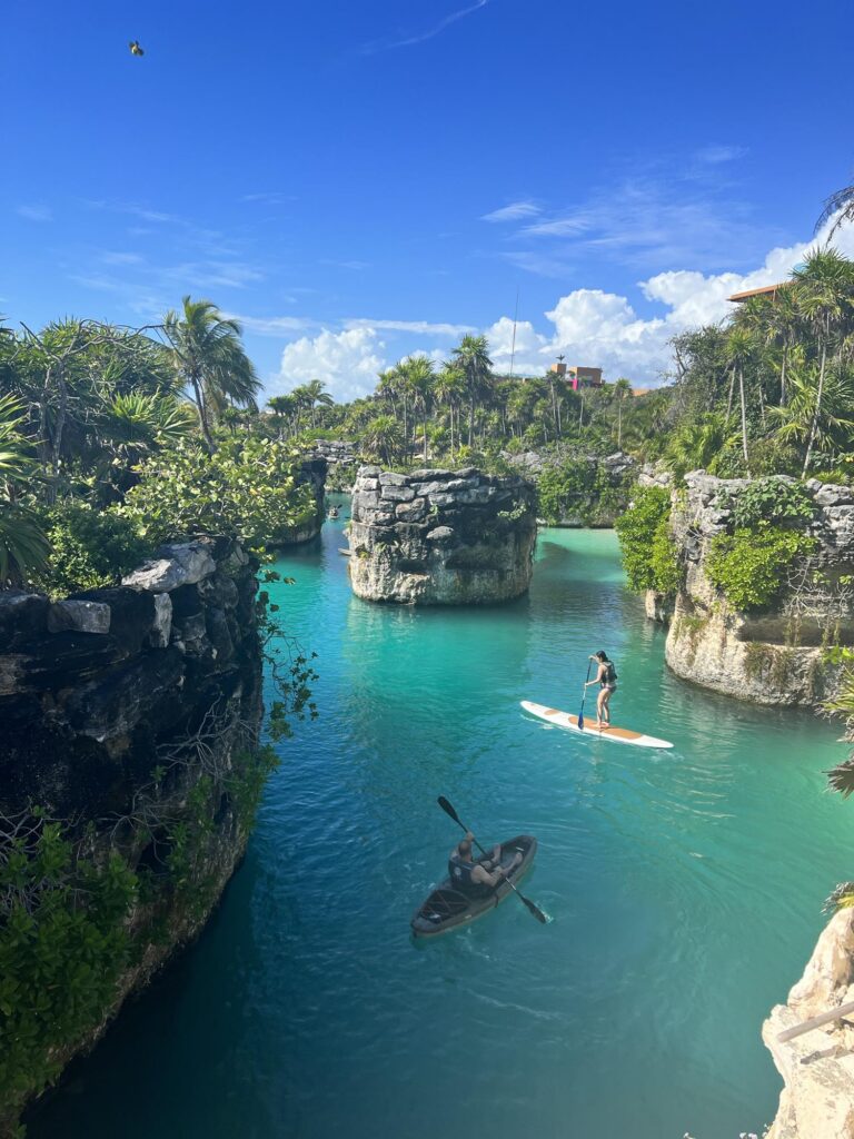 Paddling in the ocean at Hotel Xcaret Arte in Riviera Maya, Mexico, one of the best all inclusive resorts for a honeymoon in Mexico​