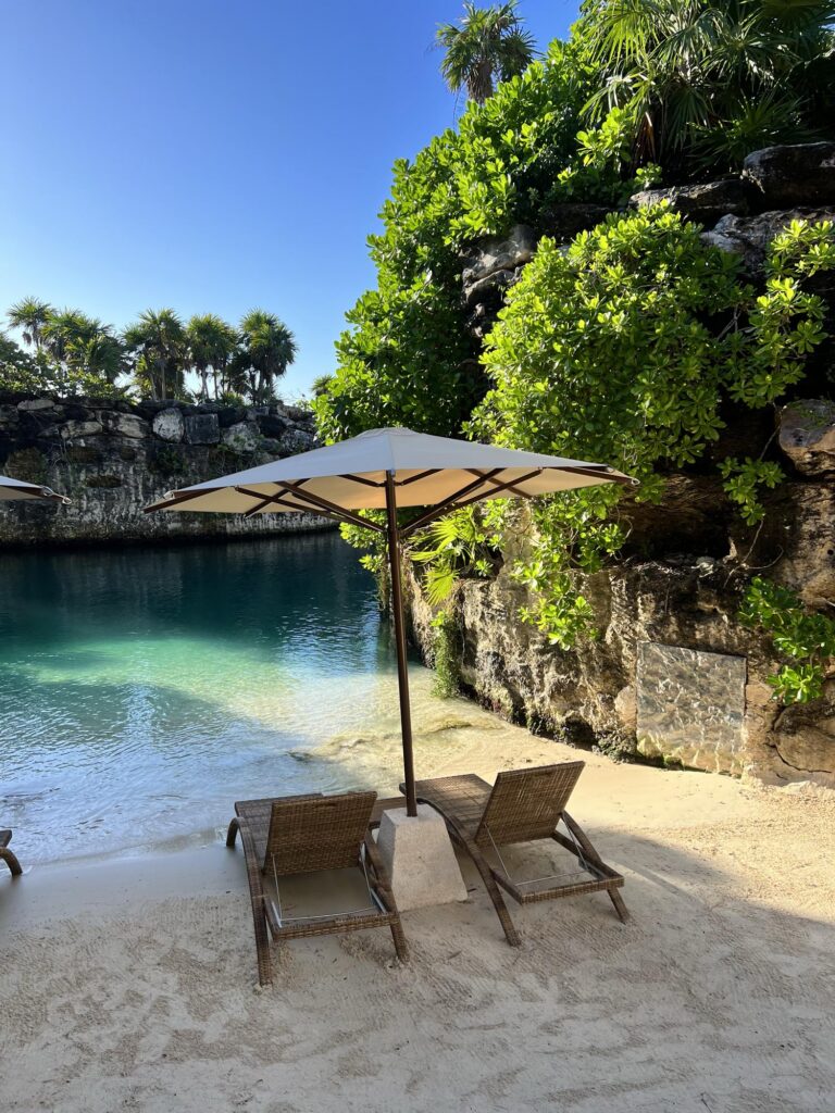Chairs on a beach at Hotel Xcaret Arte in Riviera Maya, Mexico, one of the best all inclusive resorts for a honeymoon in Mexico​