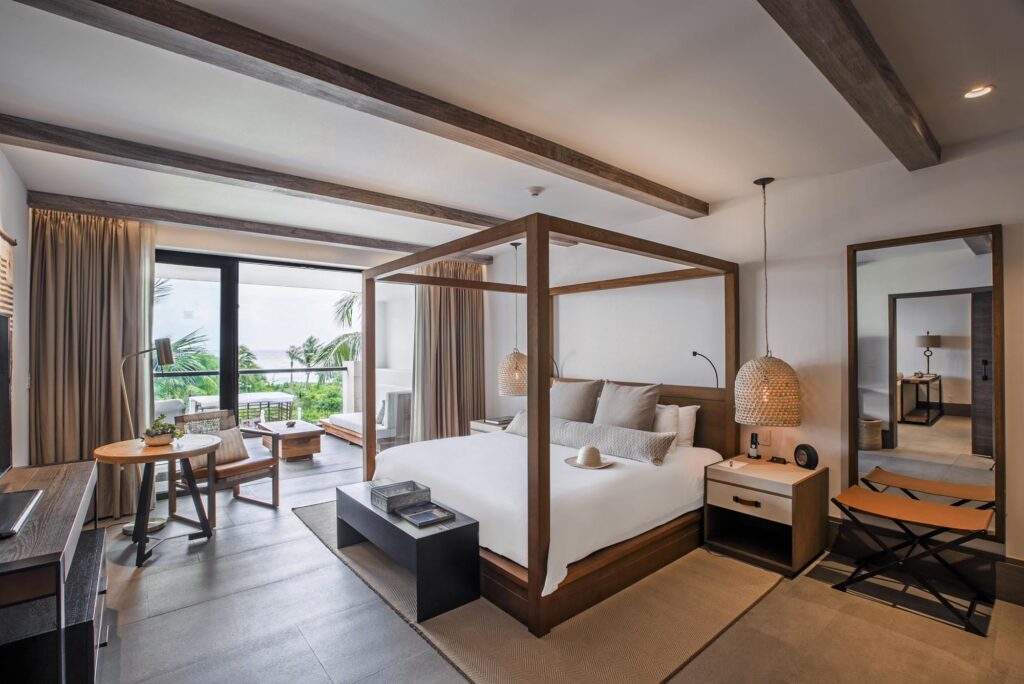 Bed in room at UNICO 20°87° at Riviera Maya, best all inclusive resorts in Mexico for honeymoon​ trips