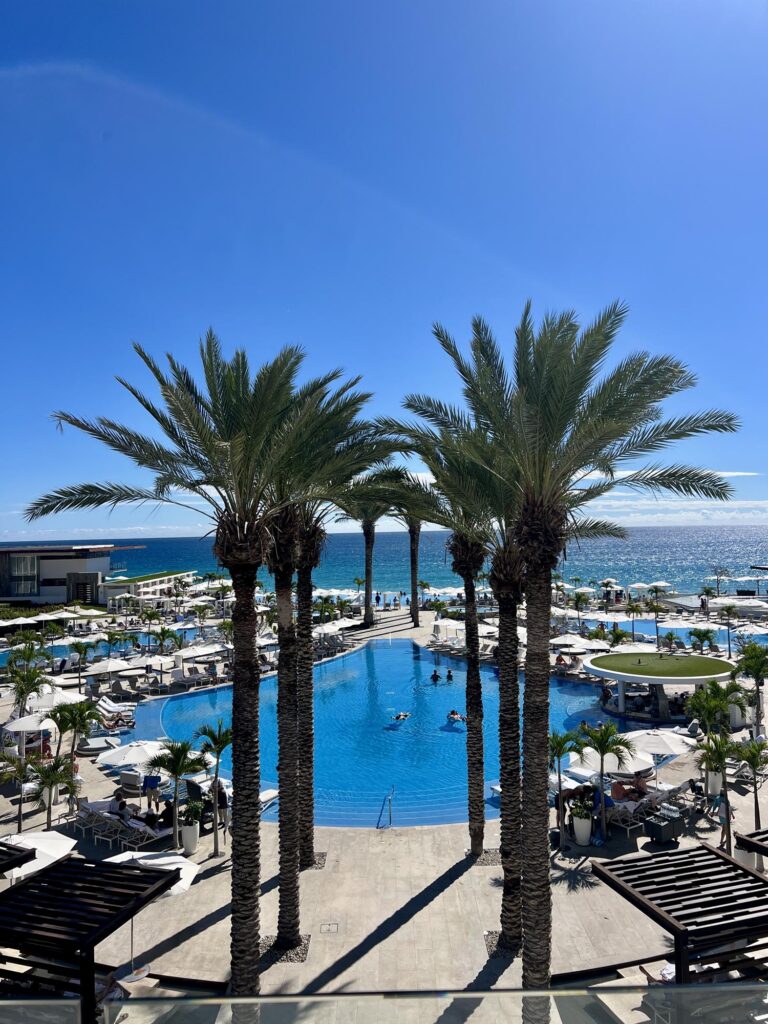 Pools and palm trees at Le Blanc Spa Resort Cabo in Los Cabos, Mexico, an all inclusive honeymoon resort in Mexico​