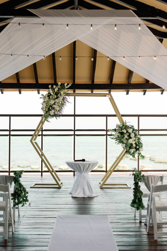 Pier Deck ceremony setup at Generations Riviera Maya for an El Dorado Royale destination wedding