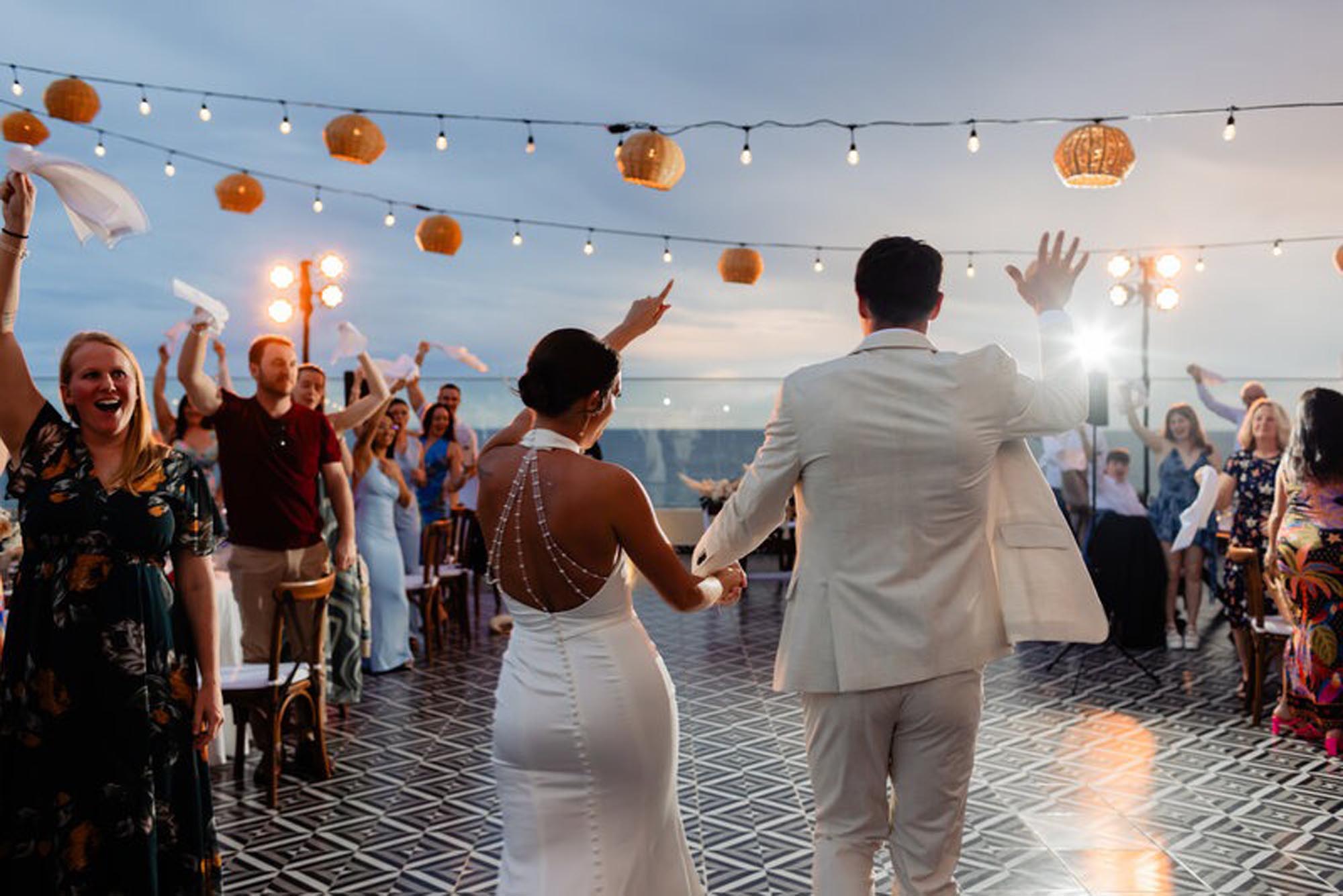 Couple celebrating at the best place to have a destination wedding in Mexico, at an all inclusive resort