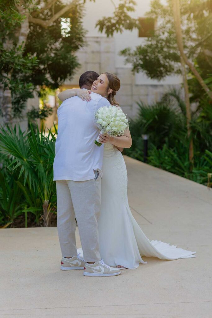 Newlyweds embracing after their first look at an intimate wedding at Unico 2087