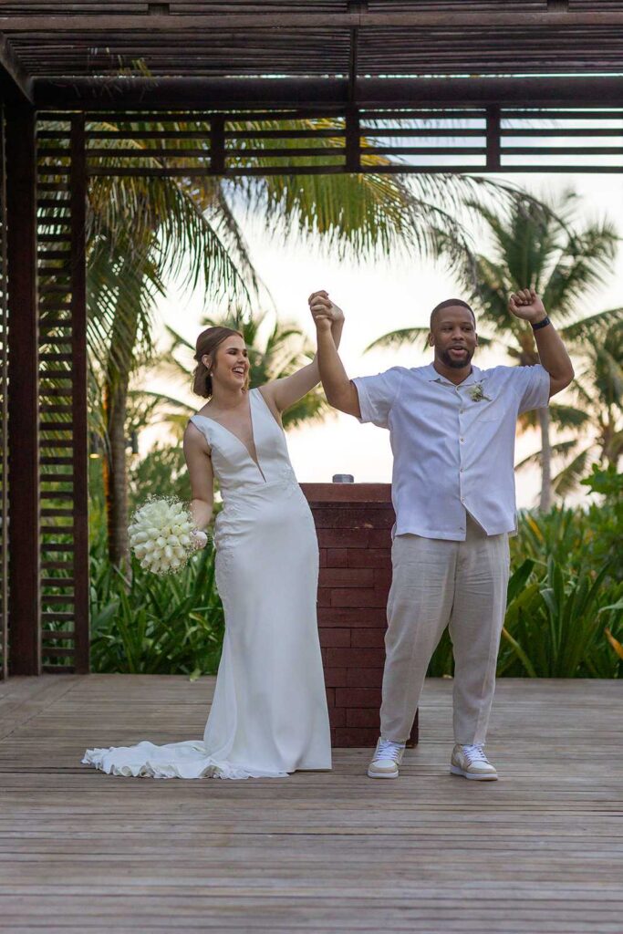 Newly married couple celebrating after their intimate wedding ceremony at Unico 2087